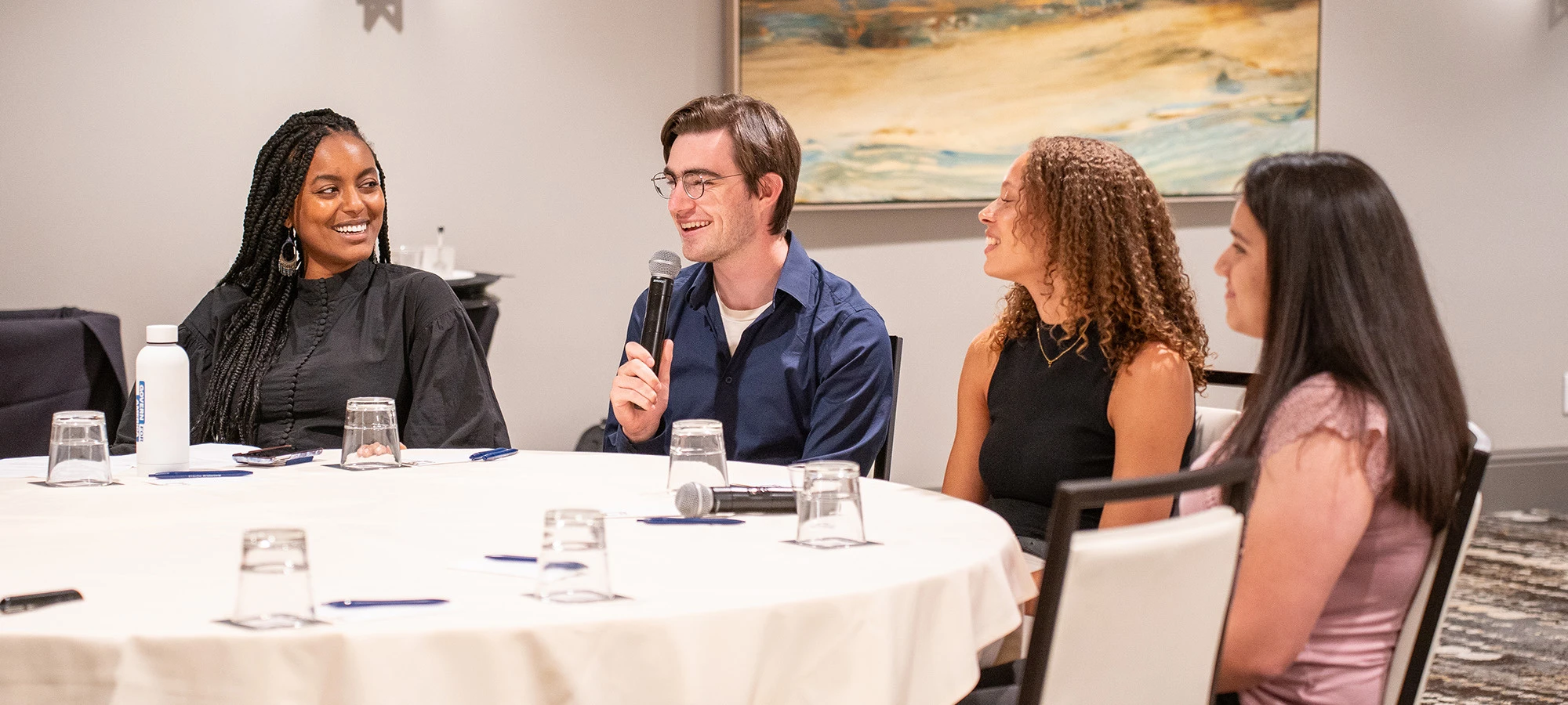 Four people at a table