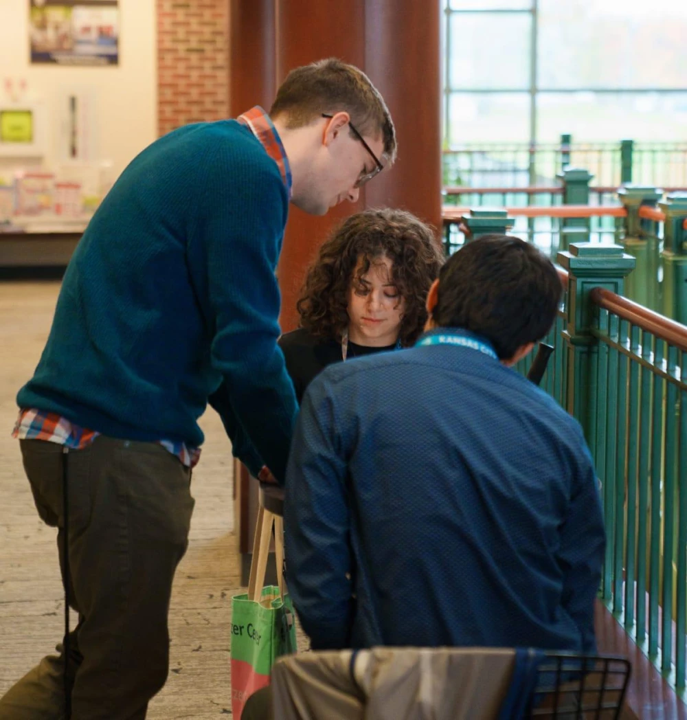 Three people collaborating